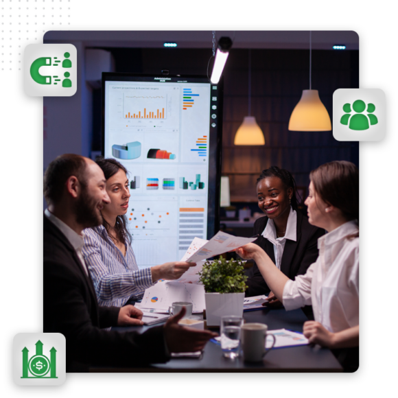 Four business professionals sit around a table in an office, discussing documents and charts. A large screen displays graphs in the background, while icons of magnets and financial growth highlight their focus on optimizing the marketing sales funnel.