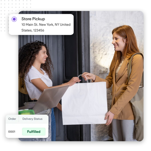 Simplify Order Fulfillment feat Img A smiling store employee hands a large shopping bag to a customer at a counter. On-screen graphics, crafted through expert ecommerce web design, show Store Pickup with a New York address and an order status marked Fulfilled.