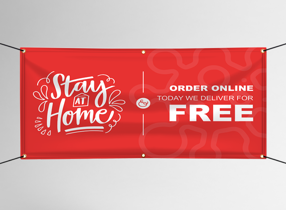 A red banner with white text that reads Stay at Home on the left and Order Online. Today We Deliver For Free on the right, with a delivery icon and decorative patterns in the background.