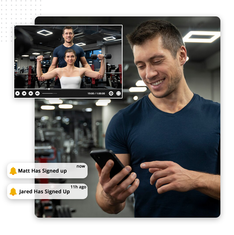 A man in a gym smiles at his phone. Above him, an inset shows two people lifting dumbbells with notifications: “Matt Has Signed Up” and “Jared Has Signed Up”—perfect visuals for a sales marketing funnel in action.