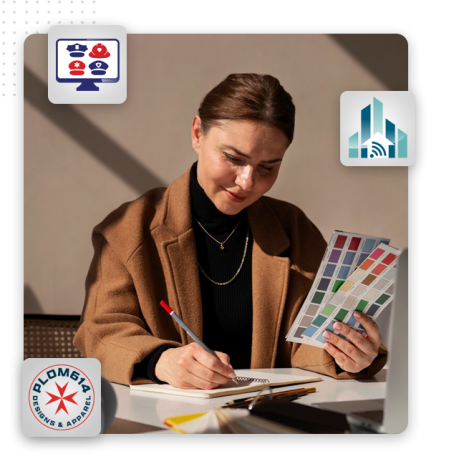 custom-logo-feat-img A woman in a brown coat sits at a desk, holding a color swatch and writing in a notebook. Illustrated icons of a computer, a building, and a logo reading DPLON614 DESIGNS & APPAREL highlight her role at a professional logo design company.