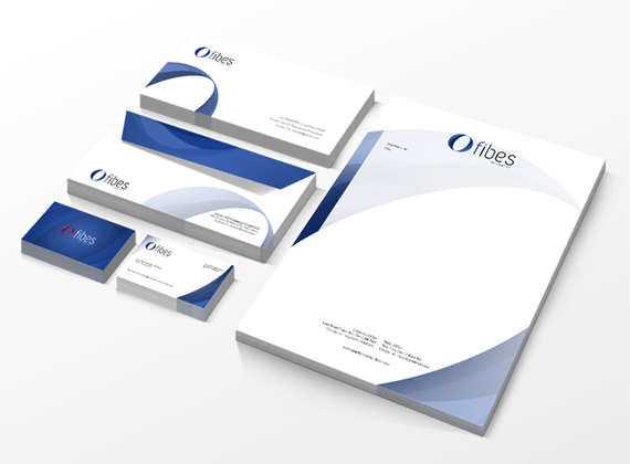 A set of business stationery items, including letterheads, business cards, and envelopes, with a clean white background and blue geometric wave designs, branded with the fibres logo.