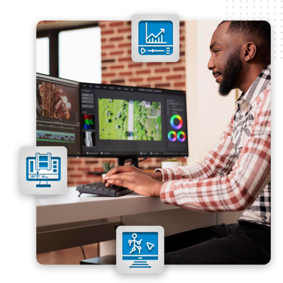video-production-feature-img A video editor works at a desk with dual monitors displaying video editing software. Three blue icons around the image represent video analytics, editing, and workflow processes in professional video production services.